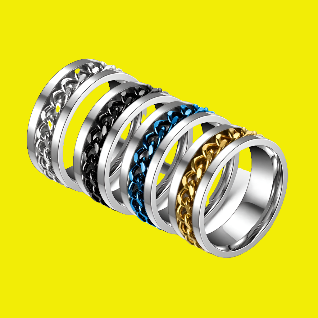 Bague Chaîne Rotative en Titane – Anti-Stress & Style
Look urbain. Détente assurée. Résistance extrême.
Cette bague mixte en acier titane est dotée d’une chaîne centrale rotative pour apaiser le stress en toute discrétion.