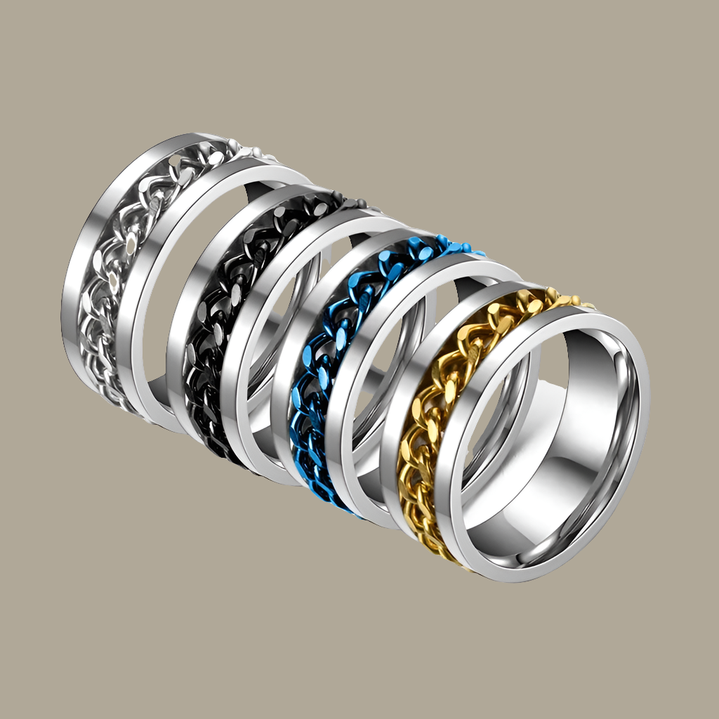 Bague Chaîne Rotative en Titane – Anti-Stress & Style
Look urbain. Détente assurée. Résistance extrême.
Cette bague mixte en acier titane est dotée d’une chaîne centrale rotative pour apaiser le stress en toute discrétion.